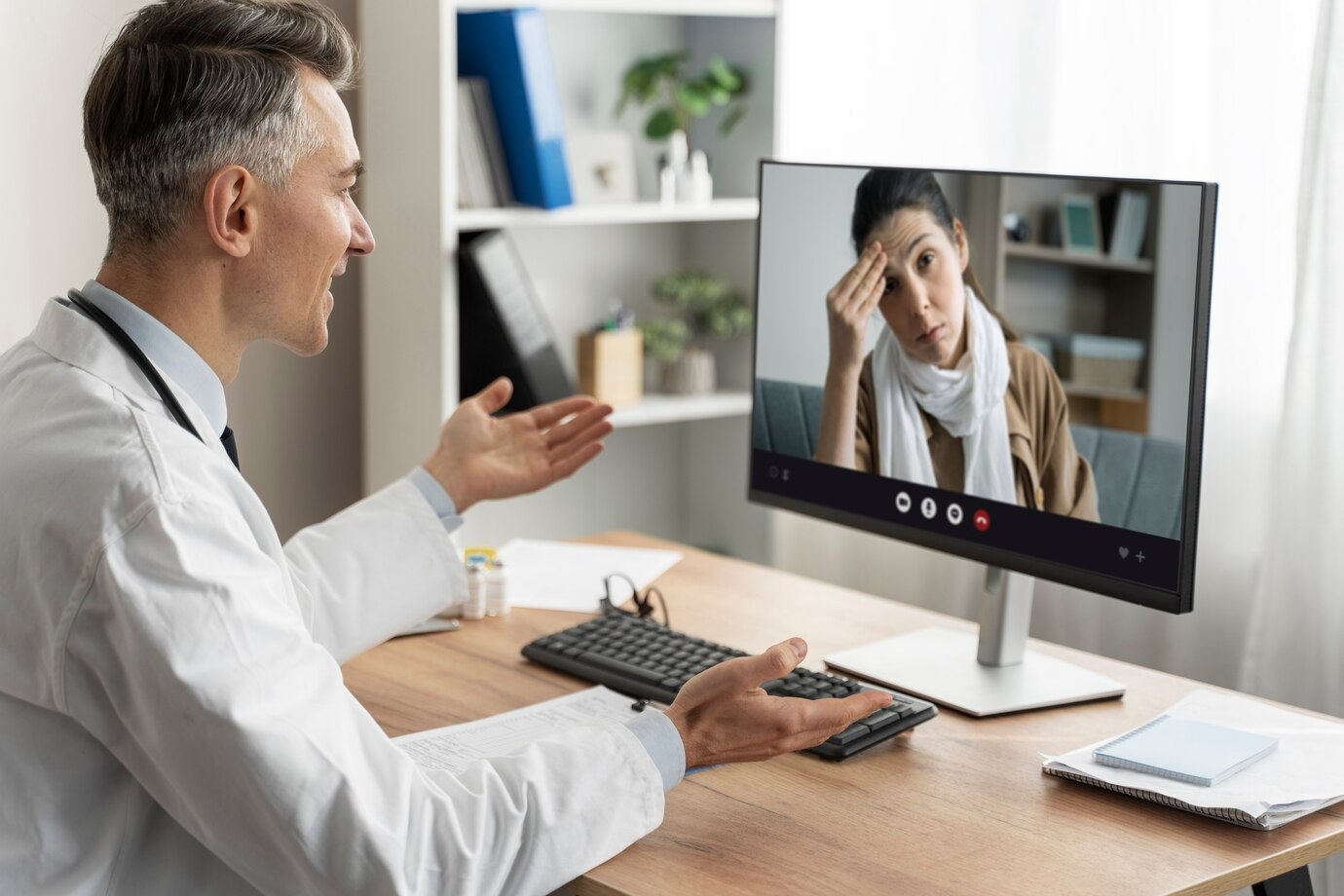 A man and a woman on a video call 